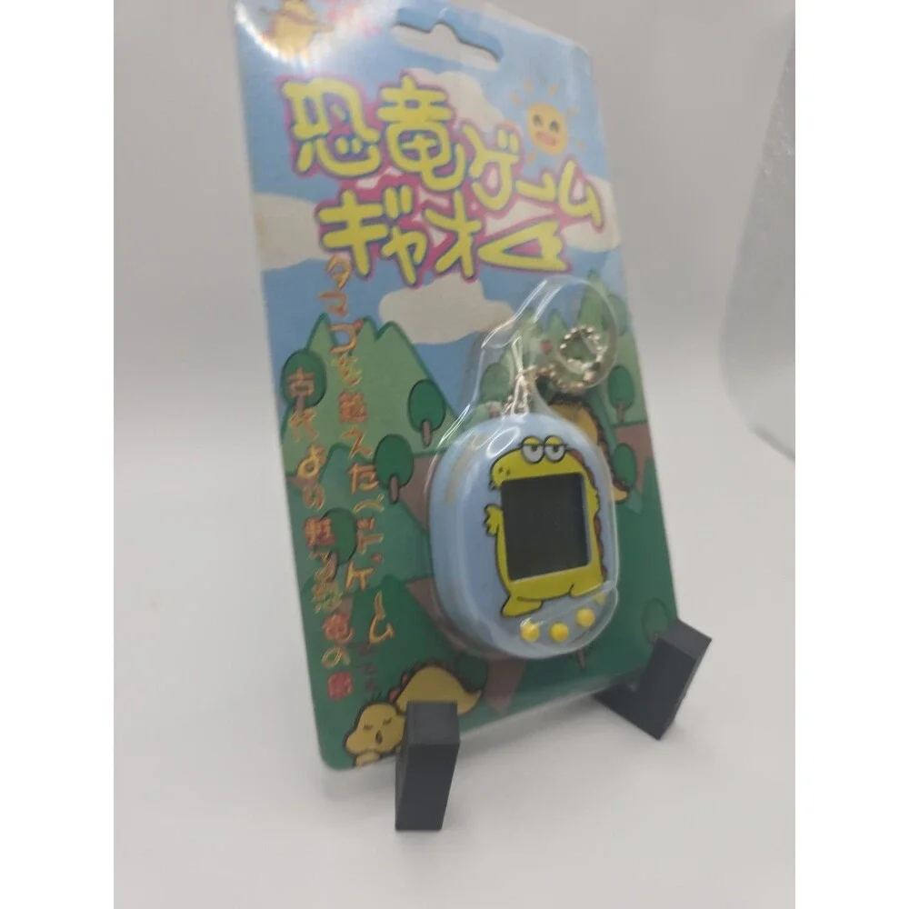 Retro Dinosaur game Gao! Tamagotchi style virtual pet - Sealed - CIB 1996/1997
